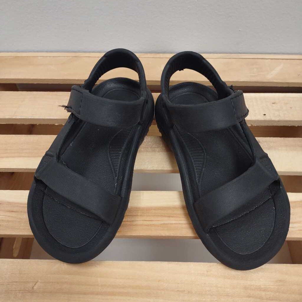 11: Teva black sandals