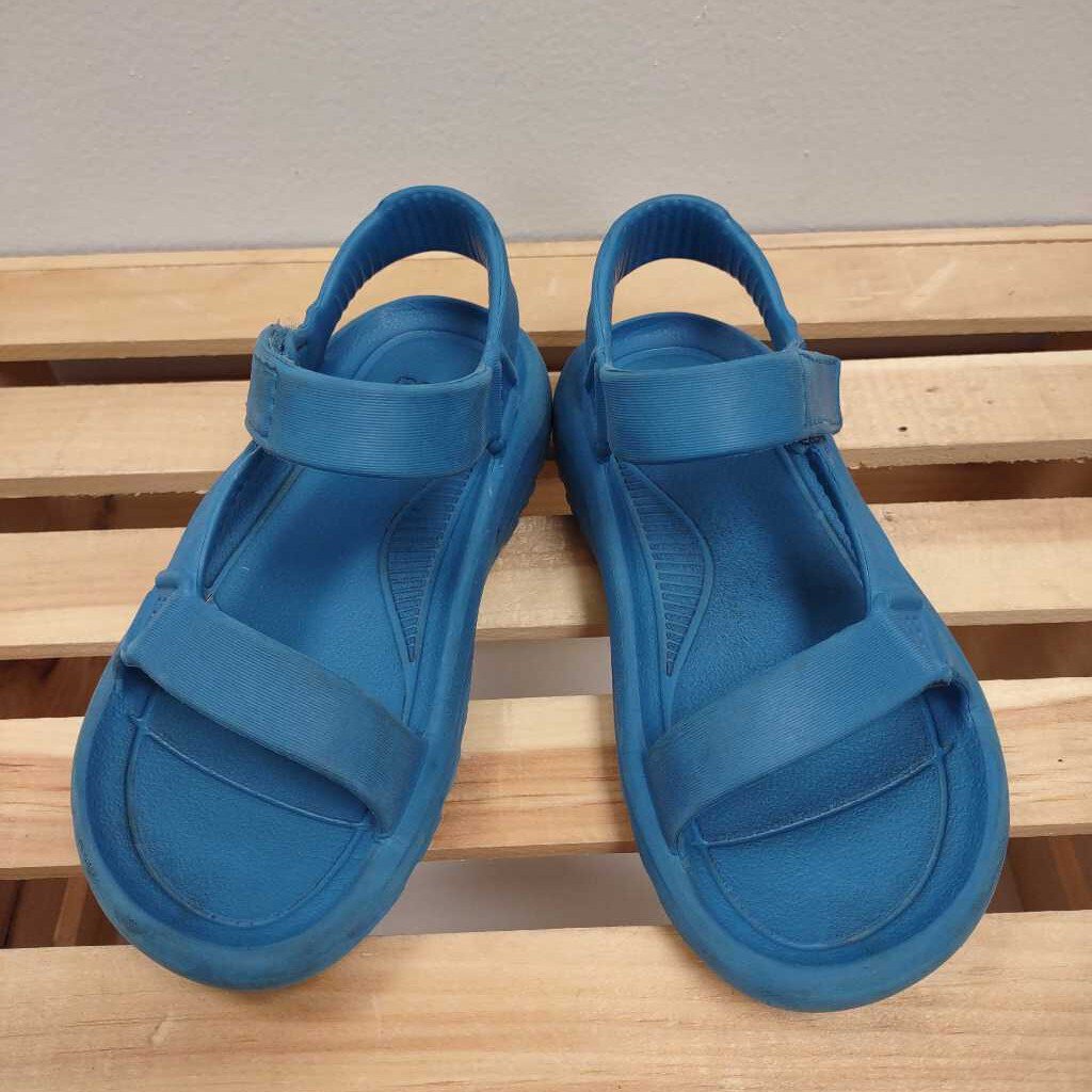 13: Teva blue sandals