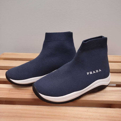 7-7.5: Prada Hi Top blue sneakers