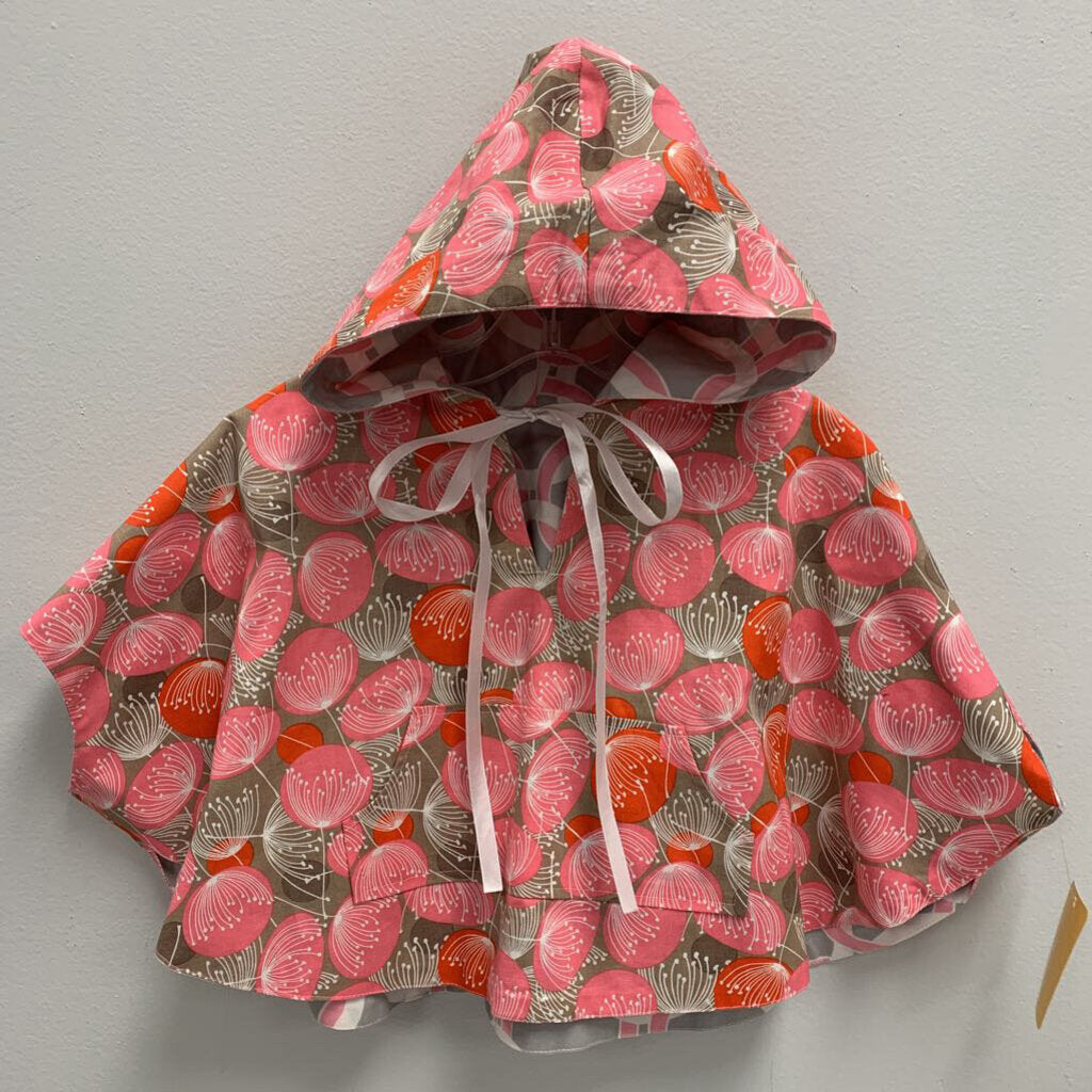 2: reversible hooded cape