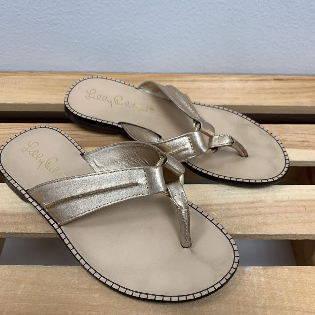 12: McKim Gold Flip Flop Thongs