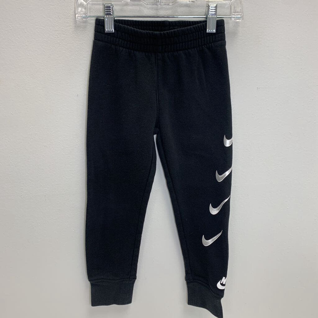 4: Joggers - Metallic Swoosh